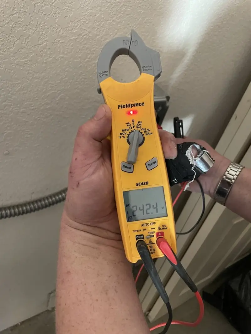 Voltage testing with clamp meter during Generator Installation in Roselle
